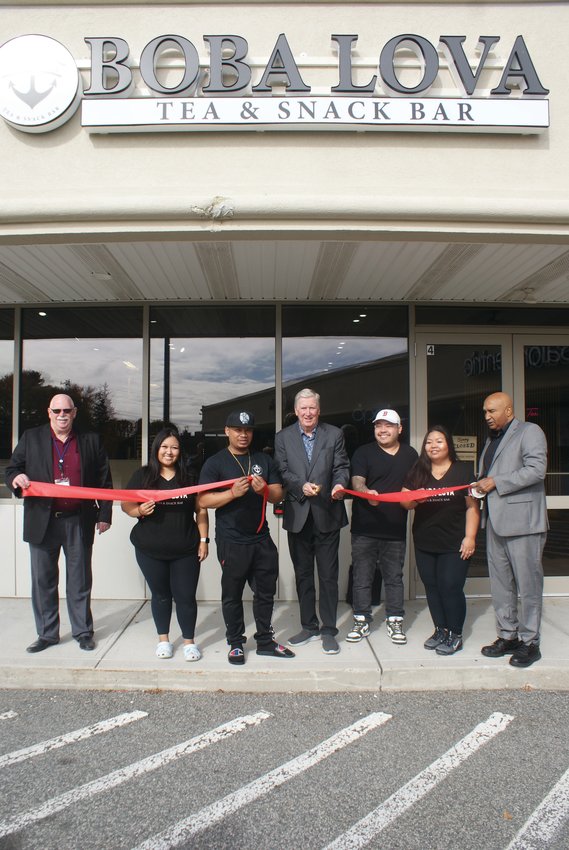 IT&rsquo;S OFFICIAL: (From left) Deputy Chief of Staff Paul McAuley, Kayley Keo, Sam So, Mayor Ken Hopkins, co-owners Soeuth and  Soknin Ky and Director of Economic Development Franklin Paulino gathered for the ribbon cutting of Boba Lova Tea and Snack Bar on Pak Avenue.IT&rsquo;S OFFICIAL: (From left) Deputy Chief of Staff Paul McAuley, Kayley Keo, Sam So, Mayor Ken Hopkins, co-owners Soeuth and  Soknin Ky and Director of Economic Development Franklin Paulino gathered for the ribbon cutting of Boba Lova Tea and Snack Bar on Pak Avenue.