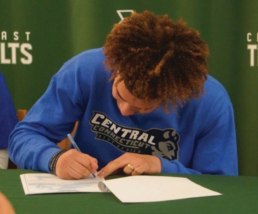 MAKING IT OFFICIAL: Cranston East&rsquo;s Randy Guzman signs his National Letter of Intent to play Division I baseball for Central Connecticut. (Photo by Albert Lopez)