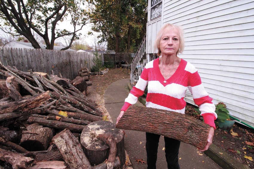 SHE CAN HANDLE IT:  As long as she has access to wood, Beatrice &ldquo;Cookie&rdquo; Pelletier will find a way of using it to heat her home, (Warwick Beacon photo)