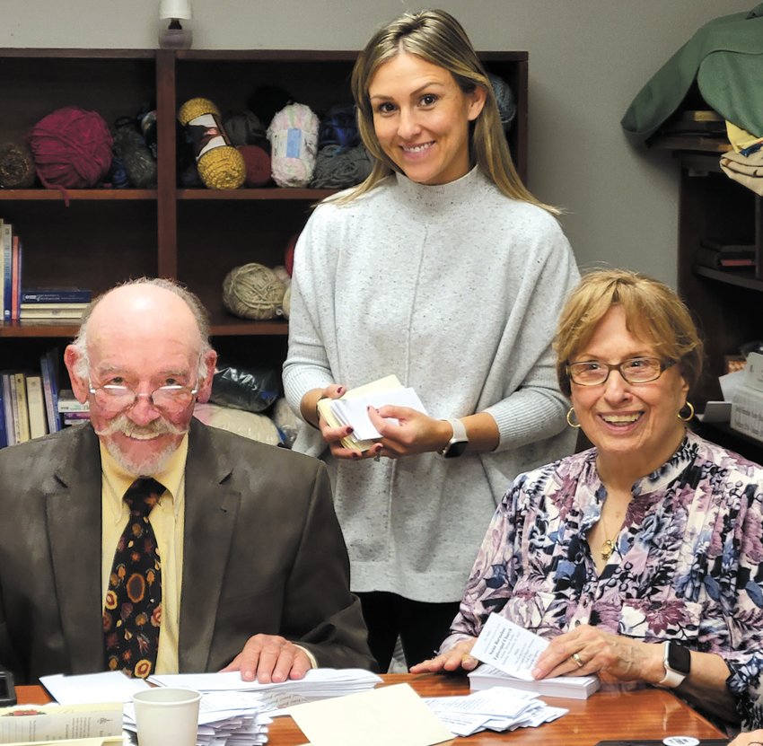 CHAIR&rsquo;S CORNER: Emily Seddon-McMahon (standing center) enjoys a lighter moment with Jim Turner and her grandmother Jean Suppappola during a recent work-session meeting for Saturday&rsquo;s annual St. Barnabas Church Bazaar. (Photos courtesy of Bonn Simonian)