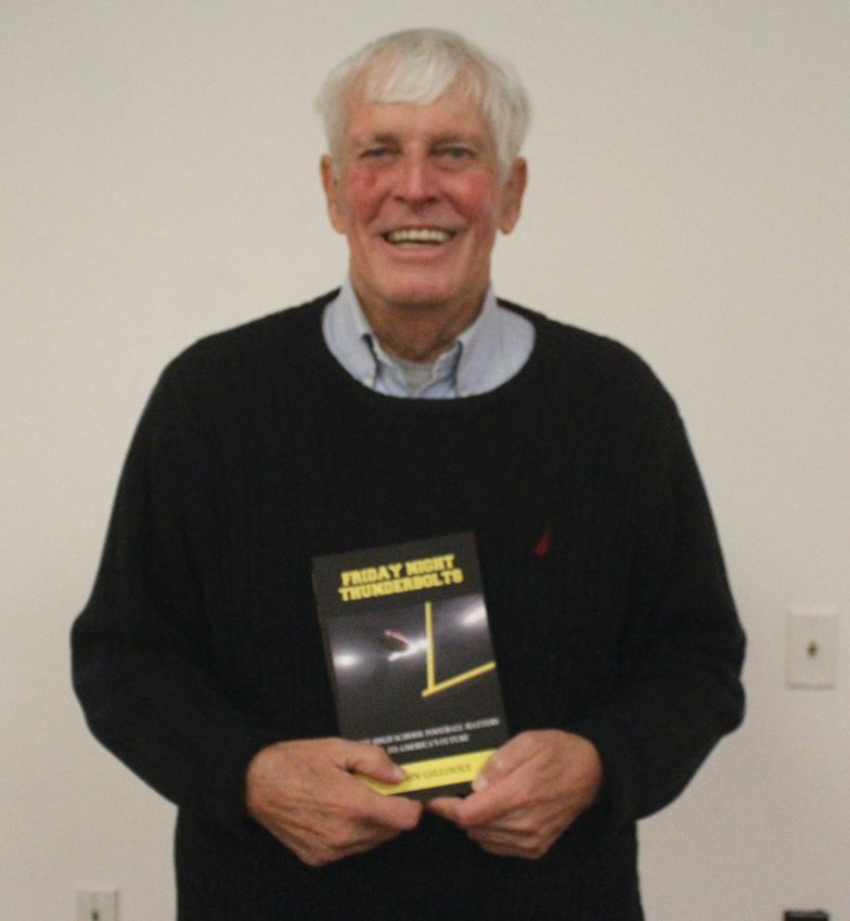 BOOK TOUR: John Gillooly shows off his latest book at an event last Saturday. (Photos by Alex Sponseller)