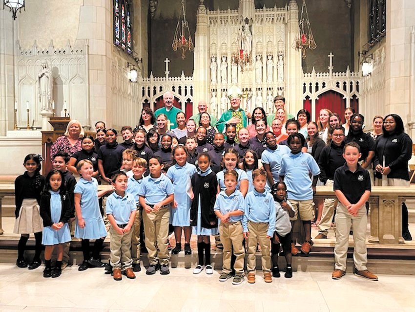 CELEBRATING THE 100TH: St. Paul School held a special mass with Bishop Thomas Tobin on Sept. 18 which many of the school&rsquo;s students attended. (Submitted photo)