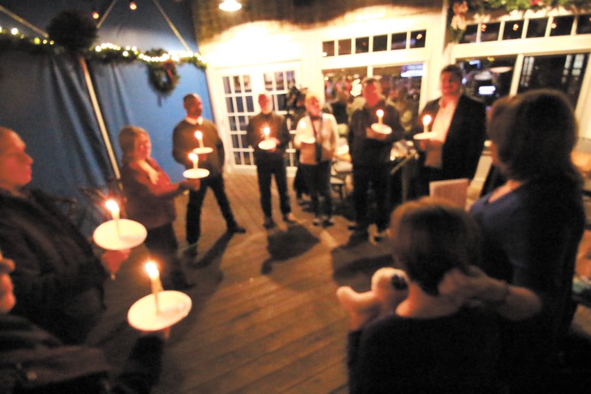 COMMUNITY GATHERS: A candle ceremony was held Thursday night to shine the light on anti-Semitism and racism. (Herald photo)