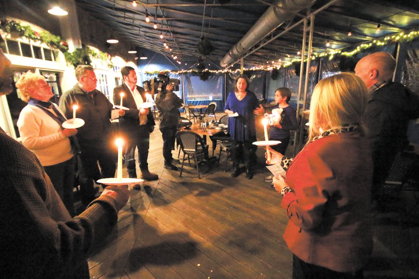 LIGHTING THE WAY: Samantha Grabelle joined by her son Darius relates why she wanted to respond to anti-Semitic and white supremacy flyers distributed in Oakland Beach earlier this year at the &ldquo;shine the light on hate&rdquo; gathering she helped inspire. (Warwick Beacon photo)