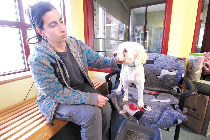 LEADER OF THE PACK: Warwick Animal Shelter Director Ann Corvin with one of the 16 dogs that a Post Road resident has surrendered to the shelter. Corvin described the female, the dominate dog of the group, as being friendly but timid with strangers and liable to nip. (Warwick Beacon photo)