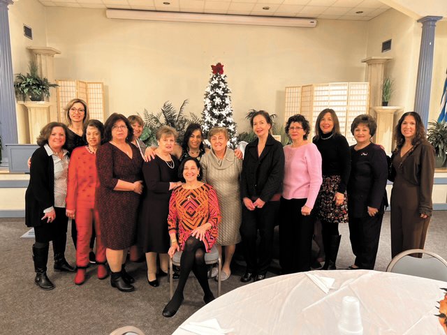 PHILOPTOCHOS PRIDE: Members of the Good Samaritan Philoptochos Society who hosted Sunday&rsquo;s Vasilopita Luncheon are: Fran Ward Smith, Nikki Malatos, Zalfa Geha, Elizabeth Degaitis, Marianne Phelan, Roula Proyous, Hoda Daiaa, Demetria Carr, Koula Rougas, Nancy Harritos, Vikki Poulos, Maria Kallis, Georgia Pappas and Karen Bablenis. (Photo by Vikki Poulos)