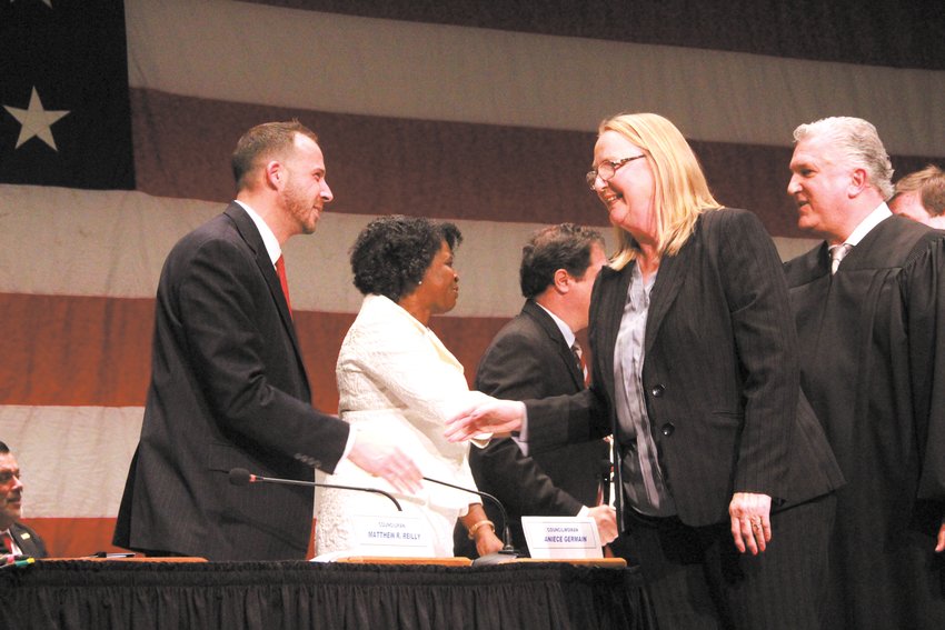 NEW PROBATE JUDGE: Cynthia Fogarty and Councilman Matthew Reilly at inauguration ceremonies Jan. 2 at Cranston West following the vote where she was named probate judge. (Cranston Herald photo)