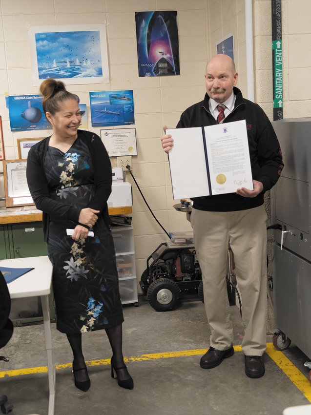 THE SWEET TASTE OF ACHIEVEMENT: Edd Spidell received a gubernatorial proclamation from Infante-Green for his long and decorated career&nbsp;as the Founder and Lead Teacher of CACTC&rsquo;s&nbsp;pre-engineering and robotics.