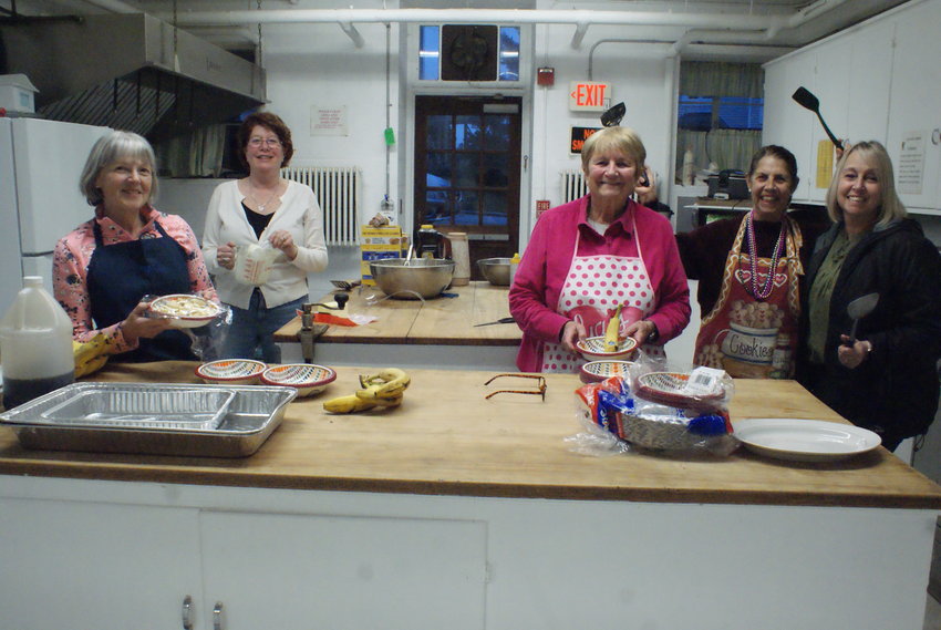 KITCHEN CREW: (left to right) Nancy Dorsey, Kelley Elderkin, Nancy Plumb, Virginia Bernal-Price and Dawn O&rsquo;Hara work together to prepare for the Shrove pancake dinner