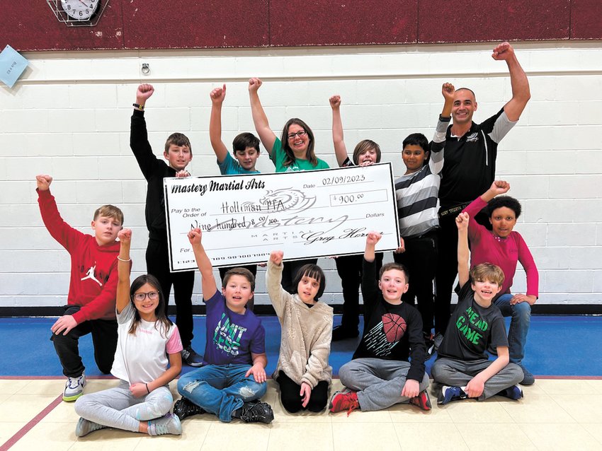 RAISING MONEY IS AN ART: The Mastery Martial Arts program at Holliman School recently raised $900 for the PTA that will use the money for cultural arts assemblies and family events. (Submitted photo)