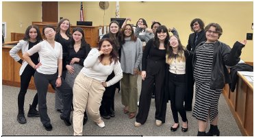 MOCK A POSE: The Cranston West mock trial team poses together with style. (Photo courtesy of Paige McClatchy)