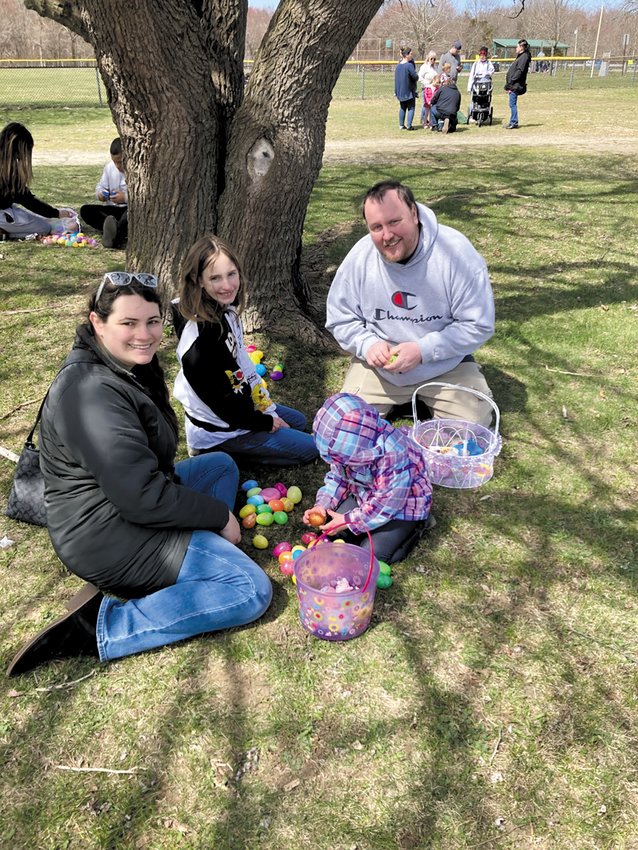 TAKING COUNT: Warwick&rsquo;s Richardson family takes egg inventory following the hunt at City Park. Pictured are: Mom, Tanya; Alice, 9; Dad, Christopher and Margaret, 3.