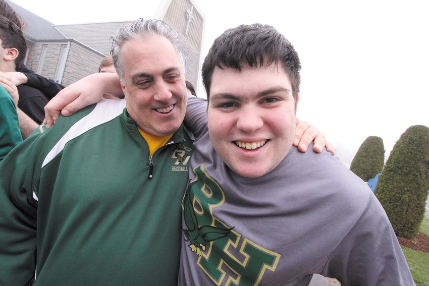 HIS LAST WALK: Peter Thomas, who is leaving Hendricken after more than two decades, made his last Hunger Walk as a member of the Hendricken staff Thursday. He is joined here by Rich Flynn, a member of the Options program at the school.