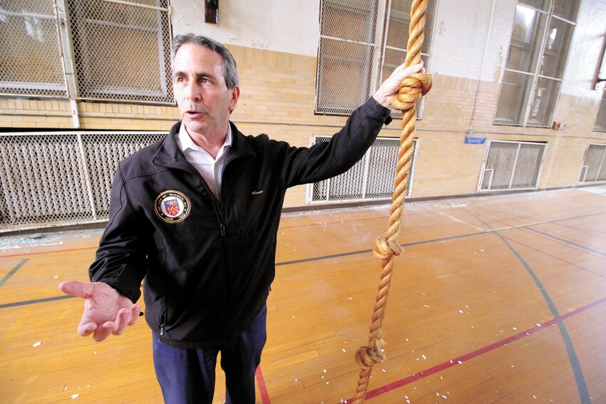 SISSY ROPE:  You wouldn&rsquo;t have caught Mayor Frank Picozzi climbing this rope as a junior high school student &ndash; it was called the &ldquo;sissy rope&rdquo; back then -  but he was seriously considering giving it a try Tuesday when he and prospective bidders for the former Aldrich Junior High School toured the building. (Warwick Beacon photos)