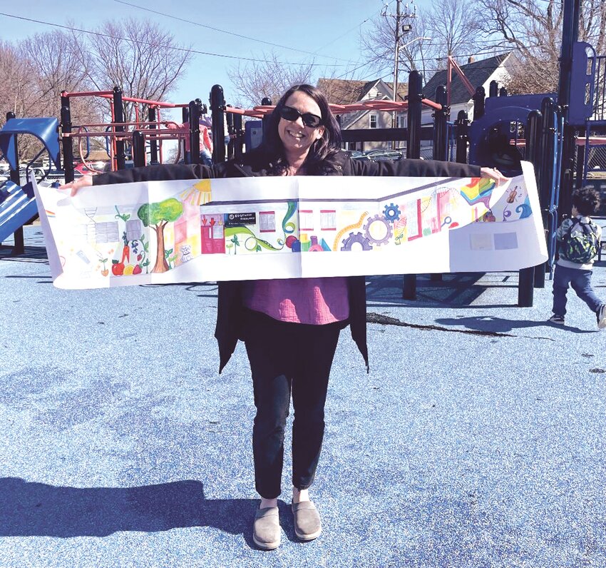 MURAL FOR THE MASSES: Edgewood Highland parent, Amy Sloane, shows off her &quot;blueprint&quot; for the mural she is painting on the school over the summer.