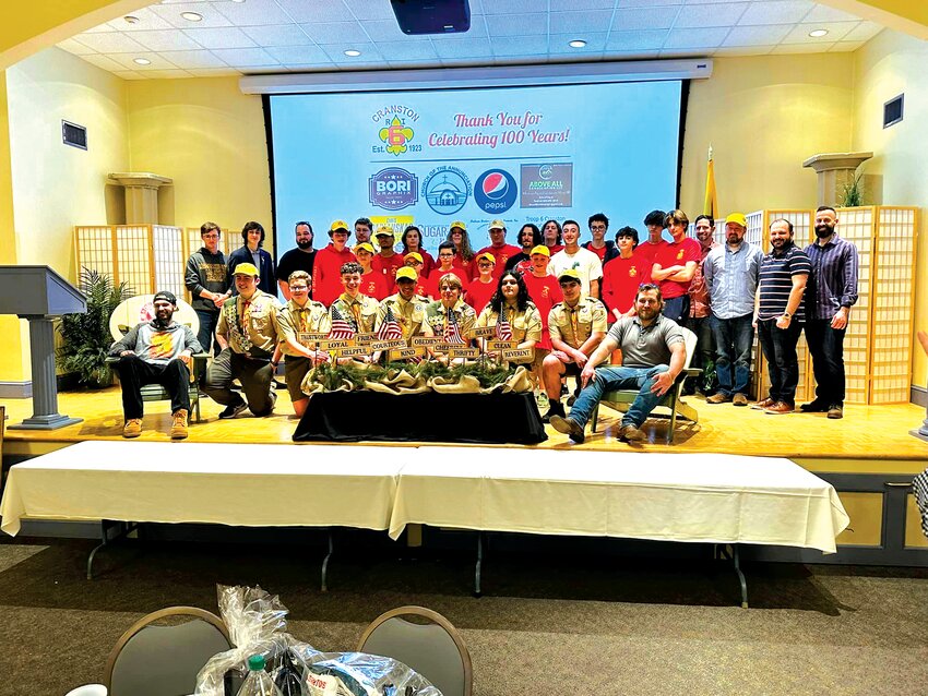 THE GANGS ALL HERE:  Troop 6 alumnus and current scouts pose for a special photo at their 100th anniversary celebration. (Photos by Pam Schiff)