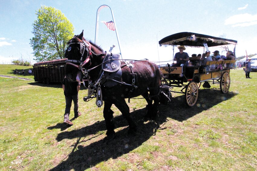 ROCKY POINT RIDES: Short horse drawn carriage rides around an area where the flume at the Rocky Point Amusement Park once operated was popular with children and adults.