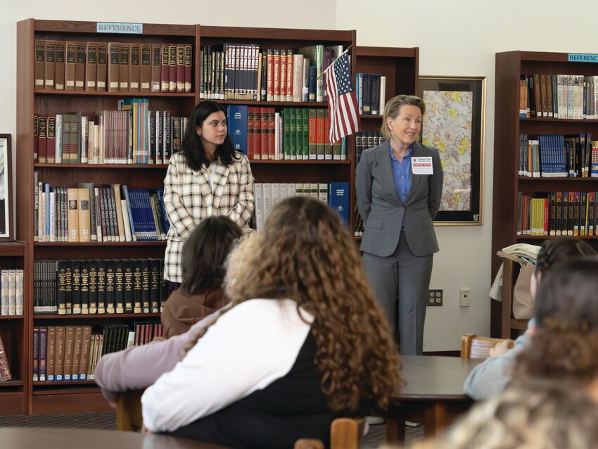 JUDGE IS IN: Judicial Clerk Maddy McGunagle and Attorney Kristen Sloan Maccini introduce themselves and discuss their careers in law on May 5 at Cranston High School West as part of Rhode Island Law Day, which introduces students to opportunities in the field.