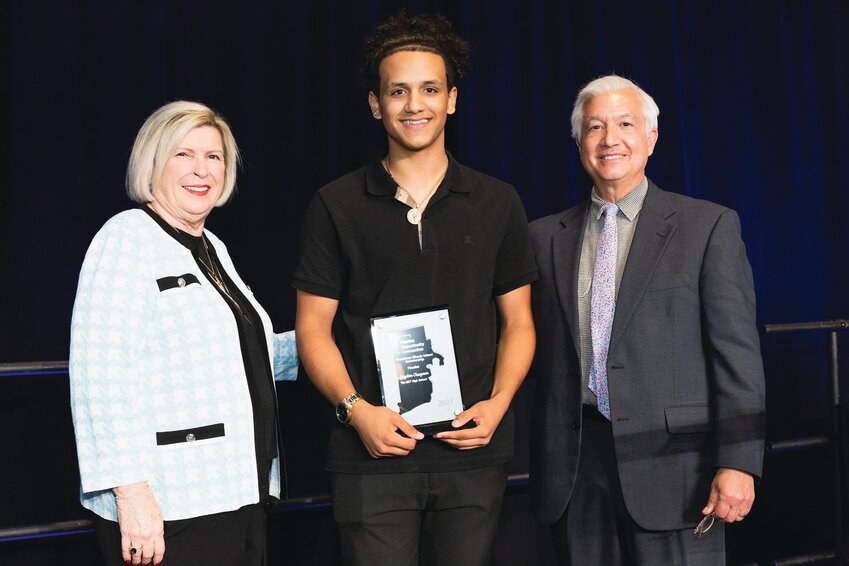 BOLD IDEAS: Jayden Chagnon smiles as he recieves his Papitto Opportunity Connection award and