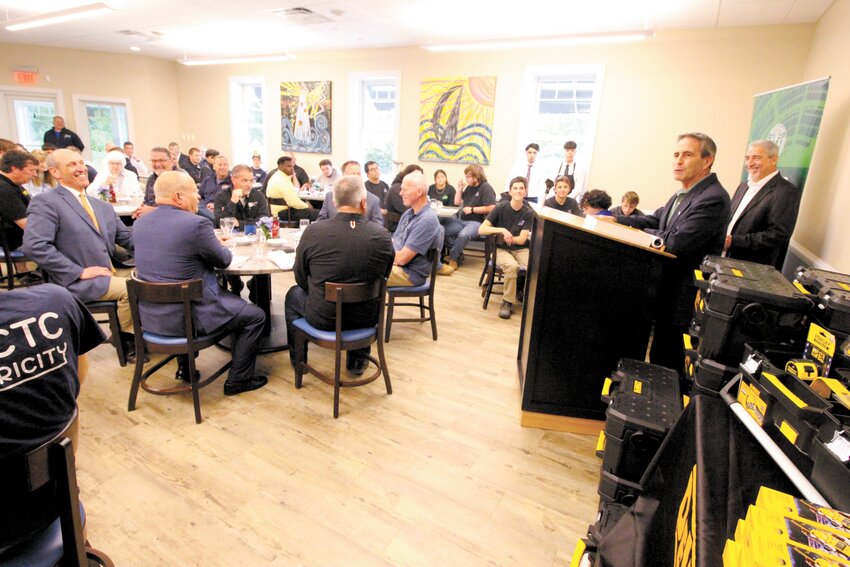 HAMBURGERS ON THE MENU: Following the speeches and the presentations Warwick Area Career Technical Center culinary students served lunch to  at the Tools for the Trades event held at Tides Caf&eacute; on Thursday.