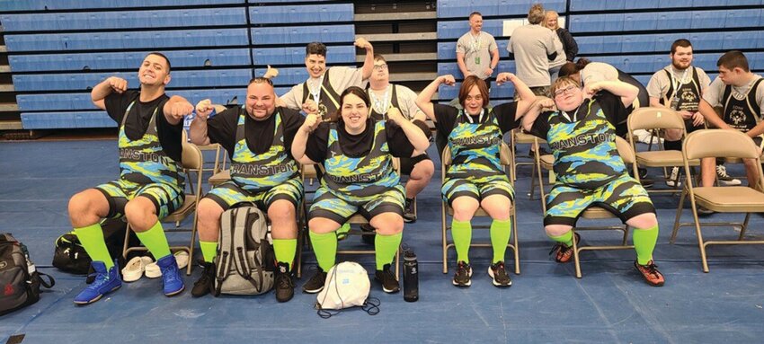 STRONG AS A TEAM: Some of the Cranston Cyclones powerlifters team (left to right) Chris Rice, Andrew Palumbo, Victoria Rossi, Mary Irons and Leeann Phillips smile together and enjoy the competition (Photo courtesy of the Cyclones)