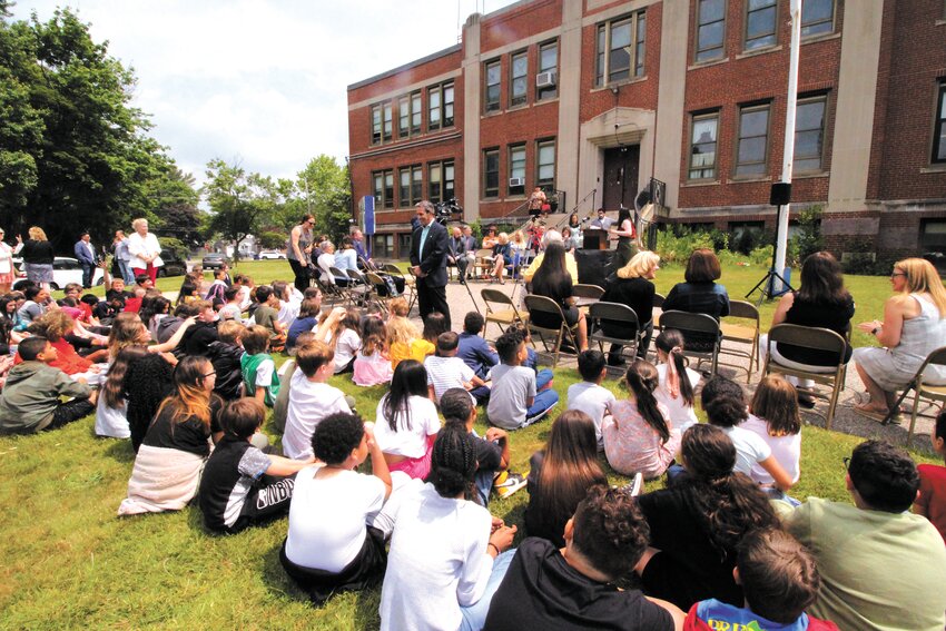 THE GREAT OUTDOORS: Mayor Frank Picozzi addresses Wyman School students Thursday. The school was the site of an announcement that Warwick is the recipient of $700,000 of a RIDE $7.5 million Learning Inside Out Outdoor Classroom program. (Warwick Beacon photos)