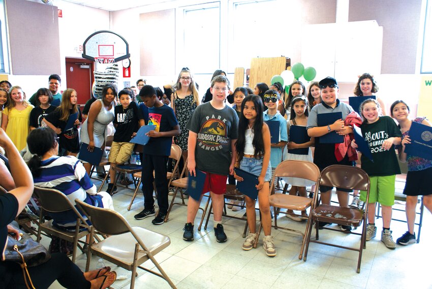 MOVING UP: The fifth grade class smiles with joy as the ceremony concludes and they get to enjoy summer break before moving on to middle school.