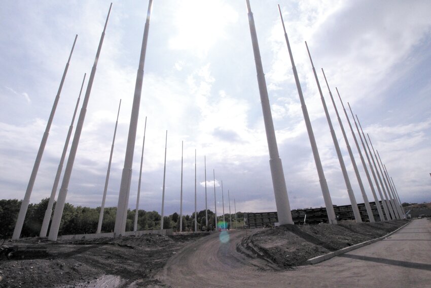 YOU WONT&rsquo;T BE ABLE TO TOP THAT: Poles that will soon hold netting stretch out from the three-level platform where people will hit balls from the $40 million Top Golf under construction across from Gar den City and bordered by Route 37.