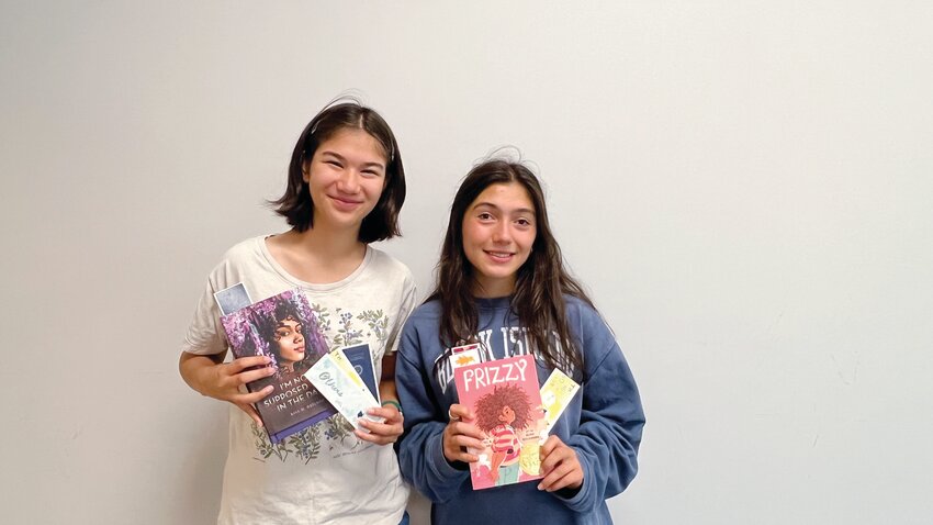 DESIGNERS: Anna Chin (left) and Stella Loezos helped to design the book marks with classmate Timothy Dietrich (Submitted photo)