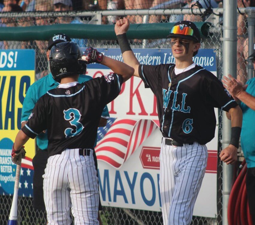 ALL-STAR ACTION: CWLL 12 year olds celebrate after scoring a run. (Photos by Alex Sponseller)