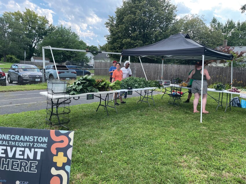 READY TO VEG OUT: The fresh vegetables are on display for people to choose from at the OneCranston/HEZ free farmer's market. (Photos by Pam Schiff)