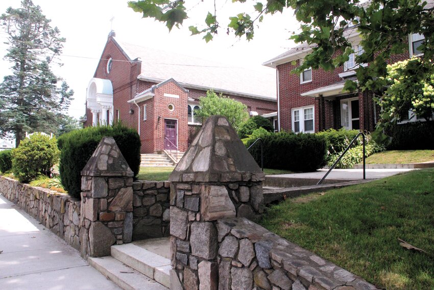 A NEW CHAPTER: The owners of St. Catherine Church in Apponaug have yet to decide the future of the property in the heart of the village. (Warwick Beacon photo)