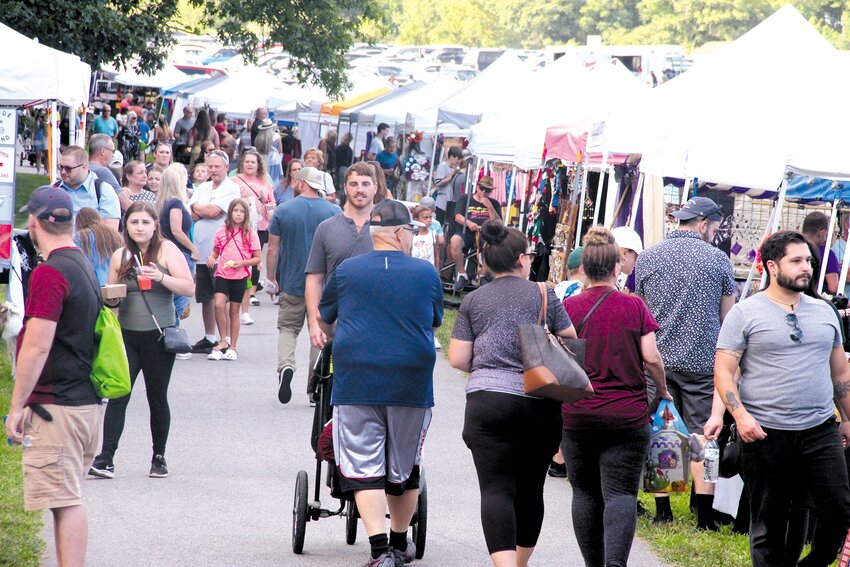 A GOOD CROWD: A walk in the park offered lots to see, buy and to eat.