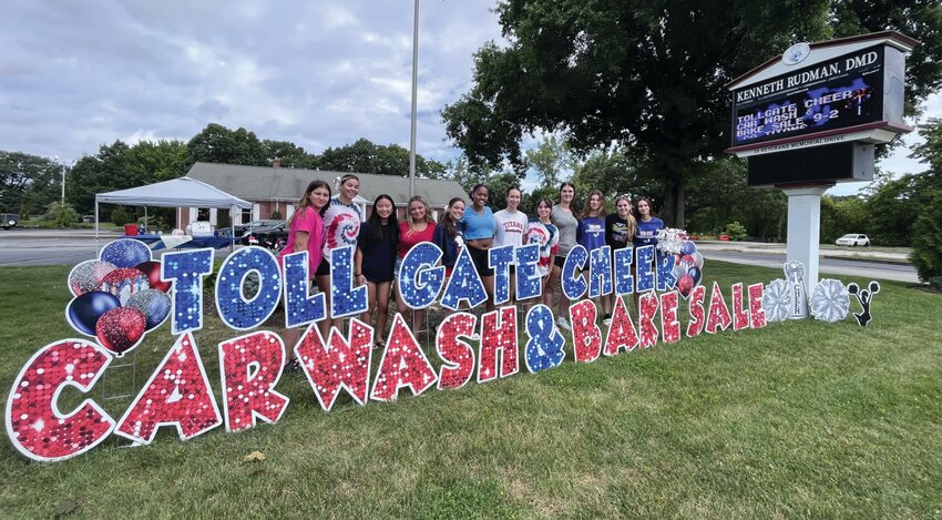 TERRIFIC TITAN TEAM: These are some members of the Toll Gate High cheerleading team who showed up to work Sunday&rsquo;s car wash/bake sale at Dr. Kenneth Rudman&rsquo;s Wave Dental on Memorial Drive in Warwick. (Submitted photo)