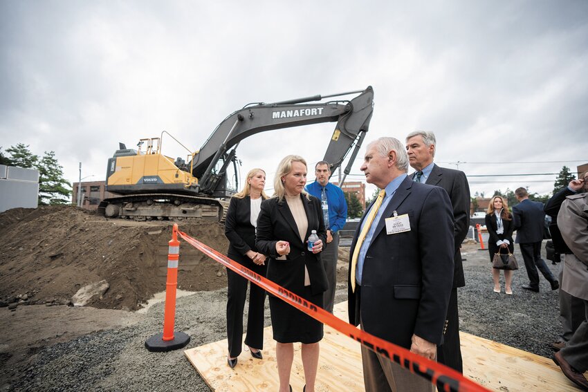 ON SITE: Kim Francis, Chief Nursing Officer, Women &amp; Infants Hospital; Shannon Sullivan,  president and COO, Women &amp; Infants Hospital; Ed W. Robbins, Jr., AIA, MCPPO,  Senior Project Manager/Architect, Care New England Facilities Development and Project  Management; and U.S. Senators Jack Reed and Sheldon Whitehouse tour the site of  the labor and delivery center. (Submitted photo)