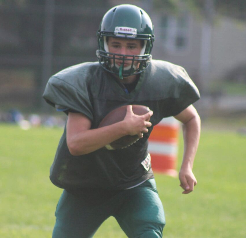 READY FOR KICKOFF: Cranston East&rsquo;s Sean Mendonca runs the ball at practice. (Photos by Alex Sponseller)