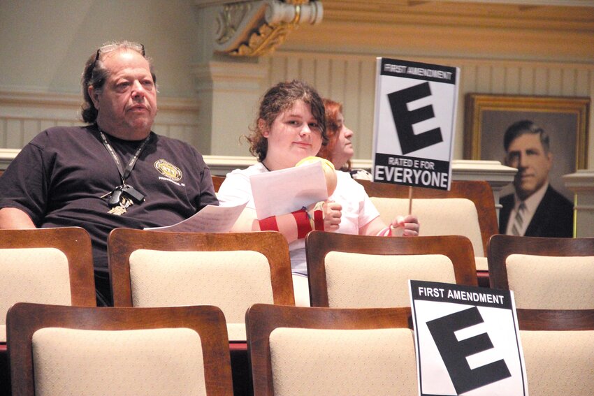 E FOR EVERYON&rsquo;S RIGHTS:  Mike DiSalvia and his daughter, Gia, were among those who scolded the City Council Monday night for not defending Rob Cote&rsquo;s First Amendment rights to the freedom of speech when he was escorted from council chambers by police at the July 17 meeting. (Warwick Beacon photo)