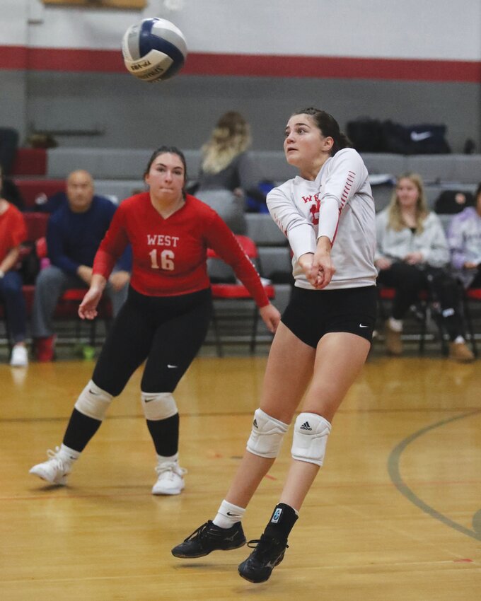 BOUNCE BACK: West&rsquo;s Mia Crudale (white) and Francesca Coppa (red) return a shot in a game last week. (Photos by Mike Zawistoski)