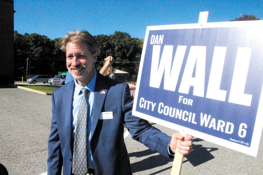 election day: Dan Wall greets voters at the polls. (Cranston Herald photo)