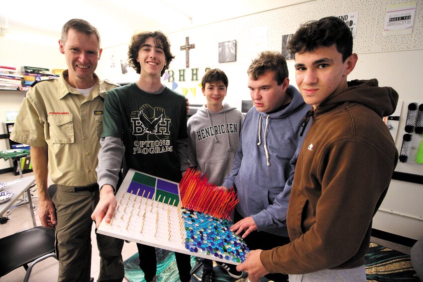 AT UNVEILING: Joining in the homeroom for the Options Program at Hendricken for the unveiling of sensory boards, an Eagle Scout project of Hendricken senior Massimo Papa are from left Bill Young, Massimo, Aidan Shea who assisted with the project, Max Mihalos and his brother Alex. (Warwick Beacon photo)