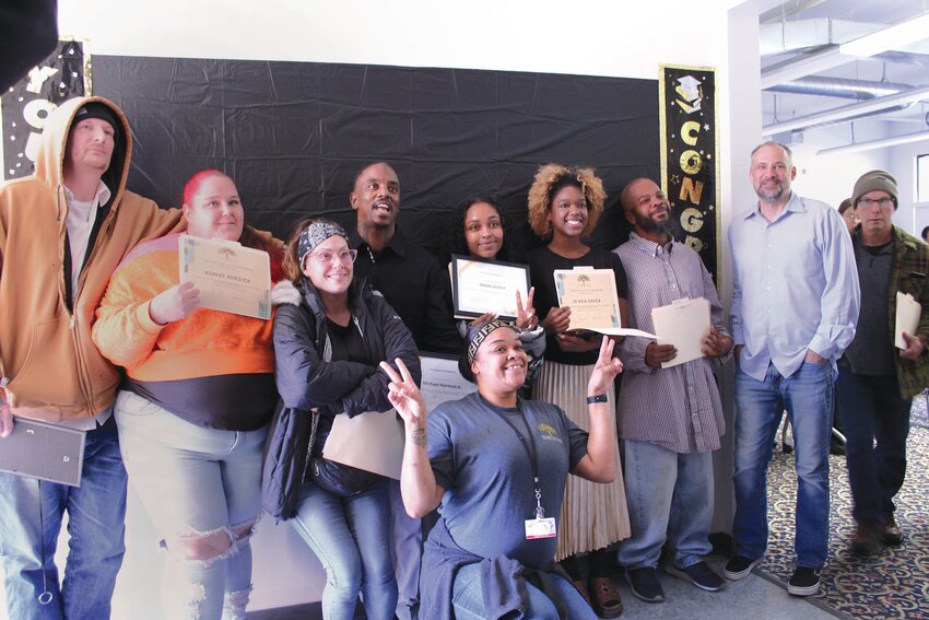 GRADUATES CELEBRATE:  The latest graduating class of the House of Hope Peer Mentor and Employment Training Program gather for a group shot following Thursday&rsquo;s ceremony. (Warwick Beacon photo by Katharine Tracy)