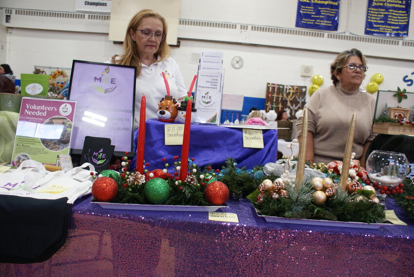 MAE MEANS MOTHER: Isa Price (left) and Gerri Duarte (right) table for MAE, an orga