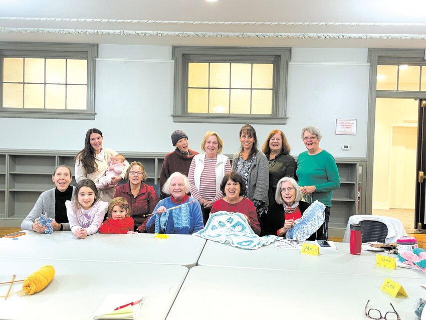 BLANKET OF SISTERS: The &quot;blanketeers&quot; of Cranston, display a few of their creations at the William Hall Library.