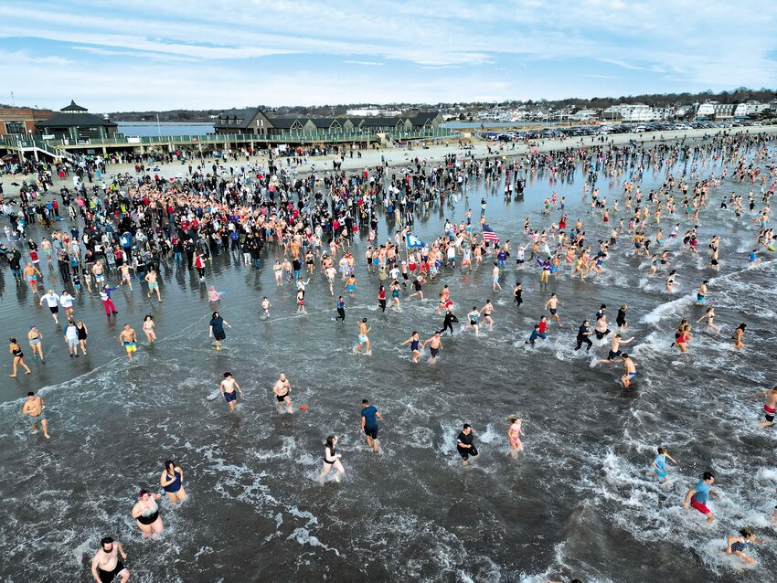 QUICK DIPS FOR A WISH: The 20th annual Popular Plunge will be held Sunday, Jan. 1 from 11 a.m. to 1:30 p.m. at Easton&rsquo;s Beach in Newport. The plunge benefits A Wish Come True that is raising funds to send two &ldquo;Wish Kids&rdquo; to Florida to visit Disney World, Universal Studios and Sea World. In this file photo from A Wish Come True  plungers make a dash in and out of the water.