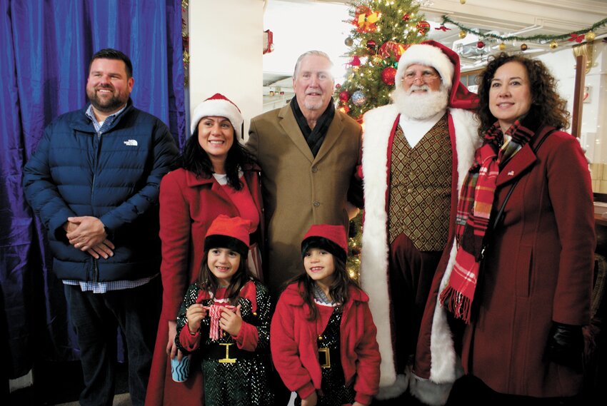 COMING TOGETHER: City Councilors Chris Paplauskas, Nicole Renzulli (with her two daughters Frankie and Jojo Martins), Mayor Kenneth Hopkins, and City Council President Jessica Marino all celebrating the night at City Hall together.