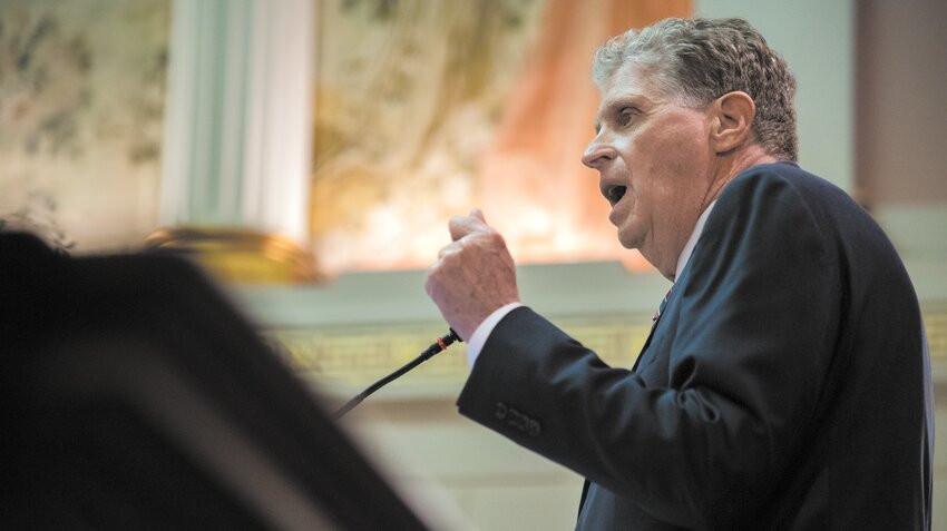 WORDS FROM THE COACH: Governor Dan McKee addresses legislators during State of the State address Tuesday.