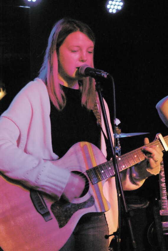 BERKLEE BOUND: Jane Kristiansen (18) a singer-songwriter from J&amp;W School for the Arts got up to the mic. She will attend Berklee college of music in Boston next year. (Photos by Steve Popiel)