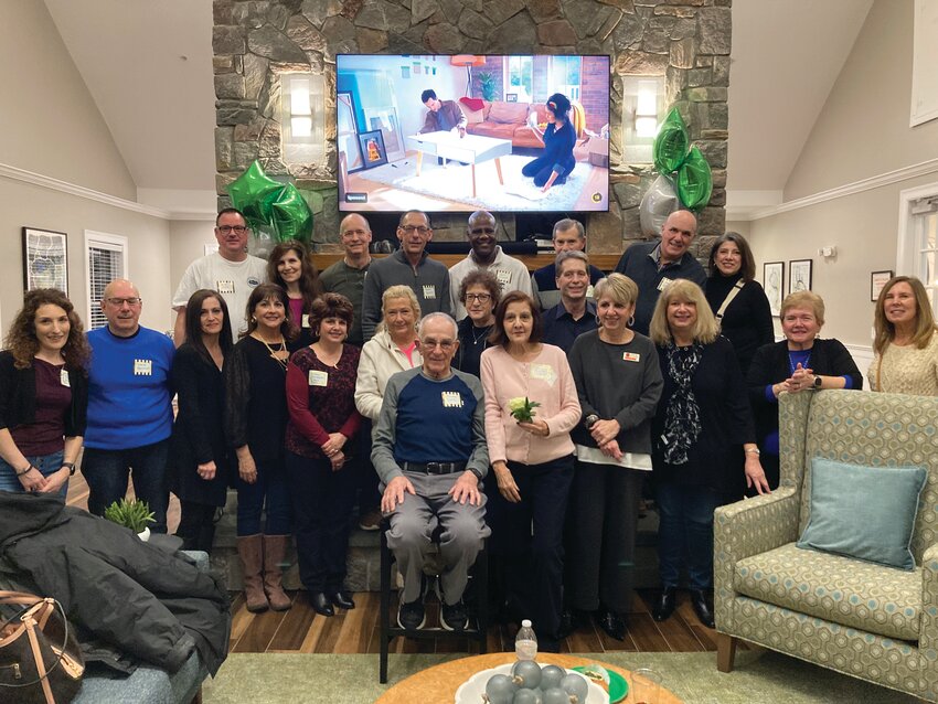 WORK FAMILY PICTURE: Former Valueland employees pose for a group photo at their reunion at Independence Place. (Beacon Communications photos by Adam Zangari)