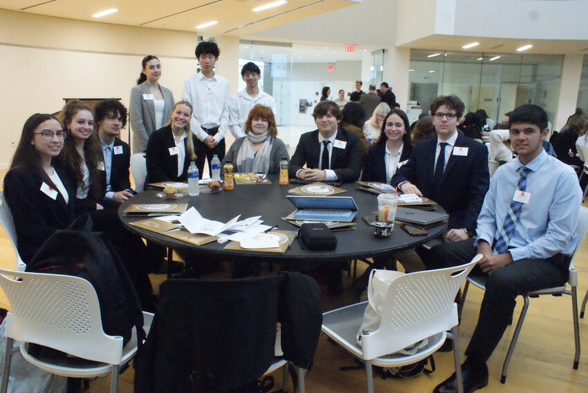 WEST CONTENDERS: The Cranston West Decathlon team before the competition with Advisor Christine Luther-Morris, winner of the year&rsquo;s Augustine Caposto Jr. Award granted to the coach of the year. (Photos by Steve Popiel)