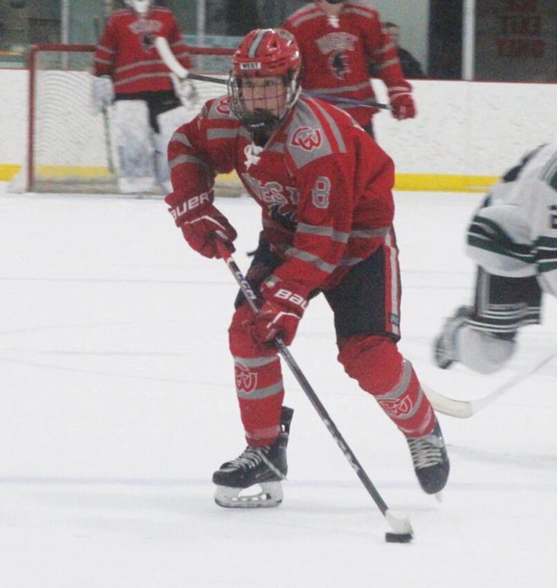 PLAYOFF BATTLE: Cranston&rsquo;s Jack Fontaine takes the puck up the ice. (Photos by Alex Sponseller)